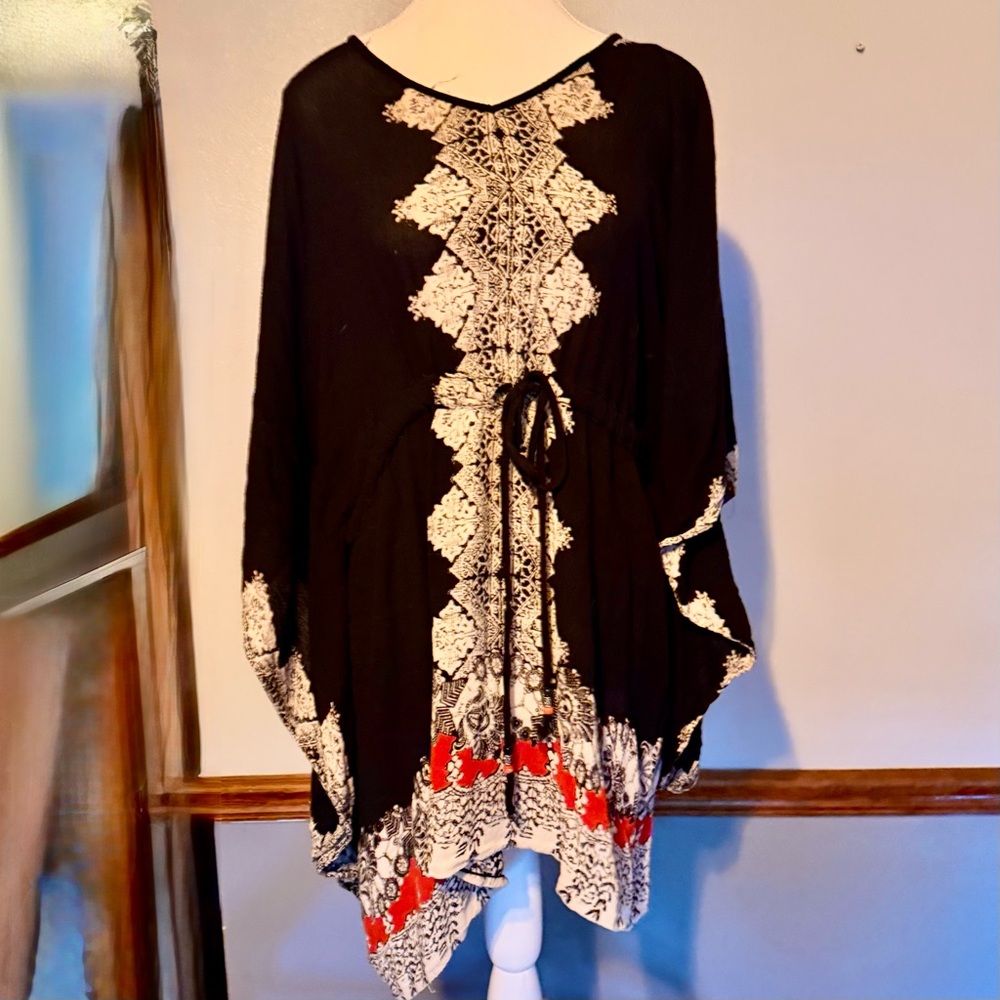 Angie black and White Patterned  Poncho dress with Red Accents